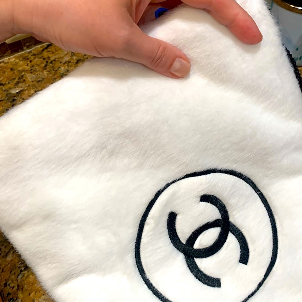 Authentic rare and  collectible large  CHANEL White Faux Fur Clutch, must have!